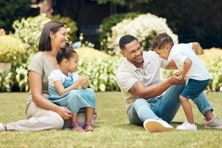 family outside playing