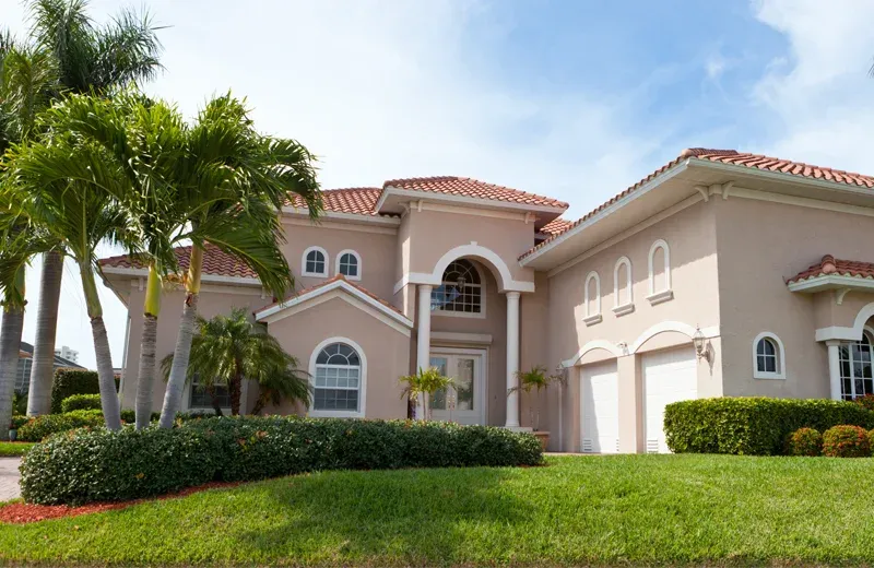 Florida home with nice green healthy front lawn